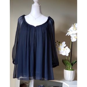 Pre owned DIANE VON FURSTENBERG 
silk scoop neck with rope detail sleeves blouse